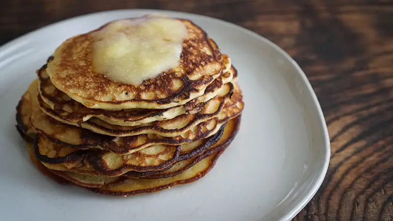 A plate of banana ghee pancakes