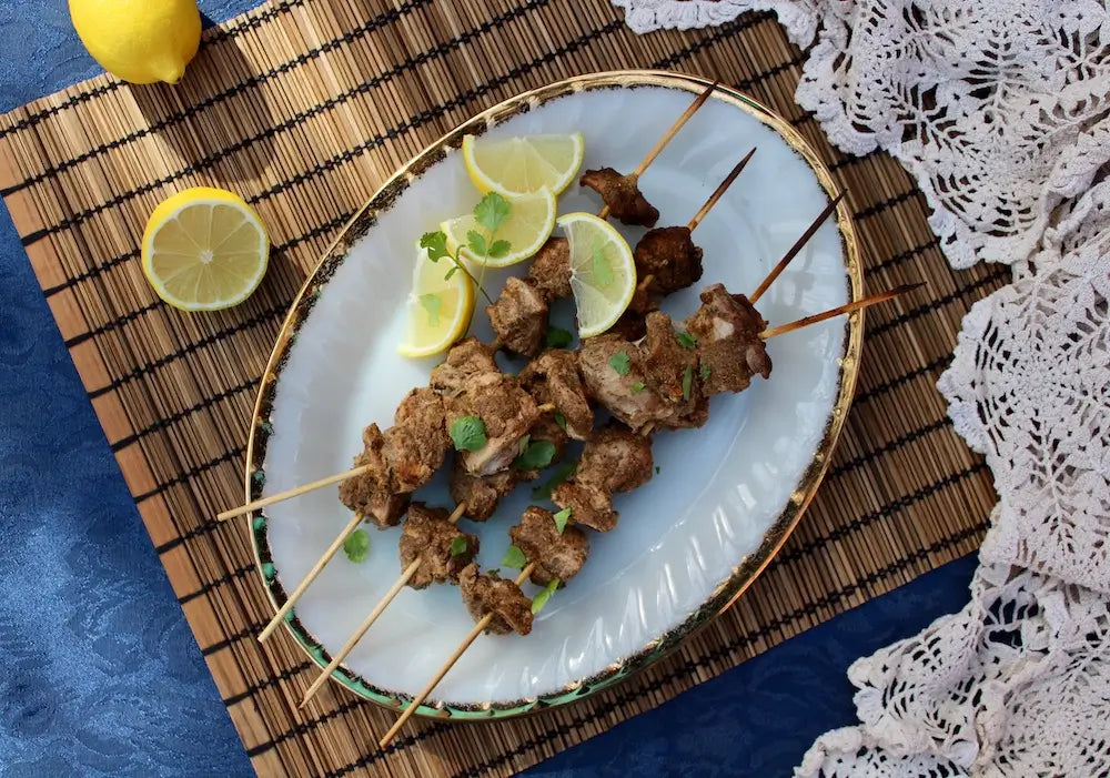 A plateful of chicken tikka kebabs