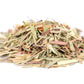 a pile of organic dried lemongrass on a white background