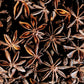 A close up of a pile of whole star anise