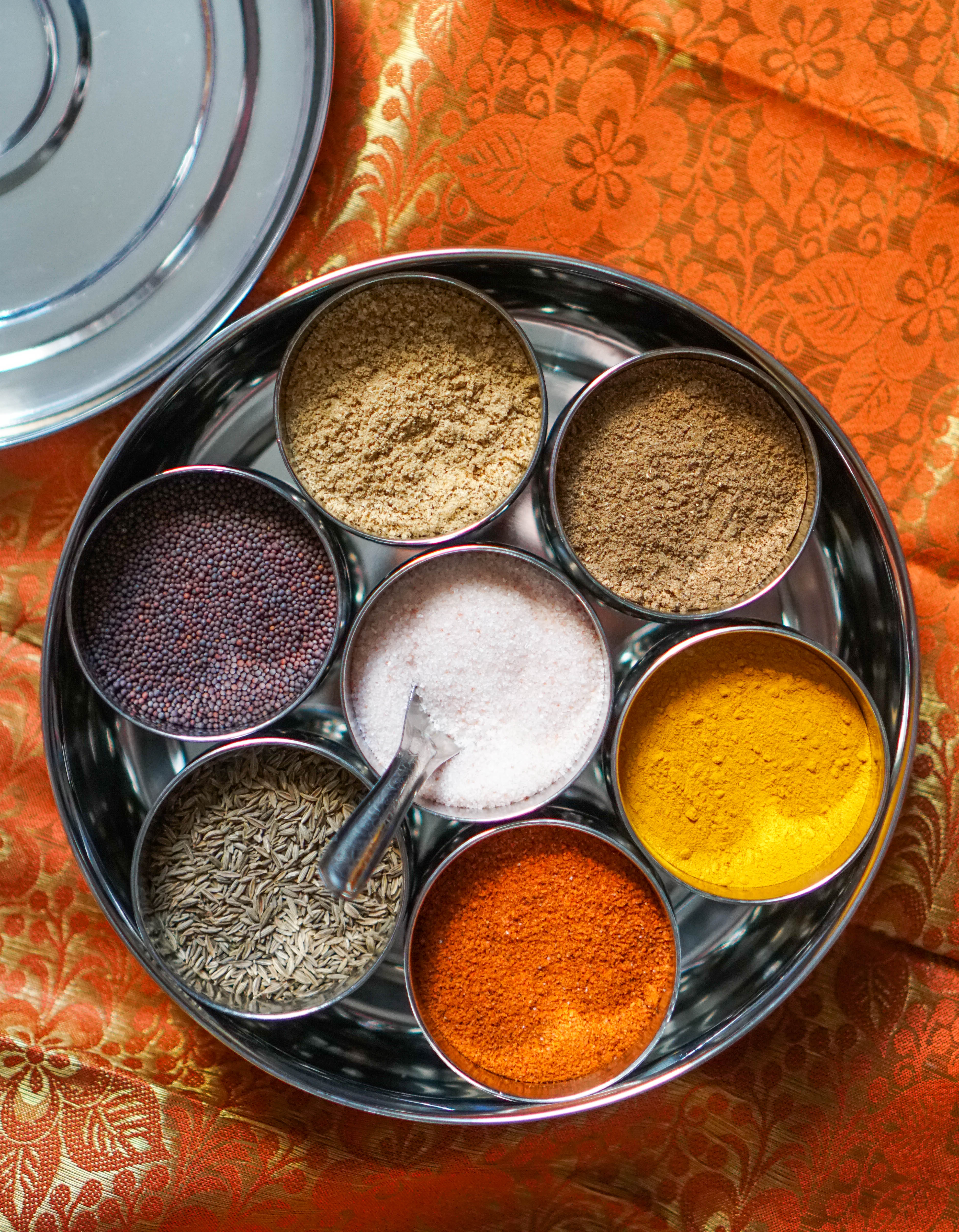 Indian Spice Tray Spice Box or Spice Rack also known as Masala Dani or Masala Dabba Stainless Steel